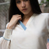 WHITE V-NECK APPLIQUE TOP